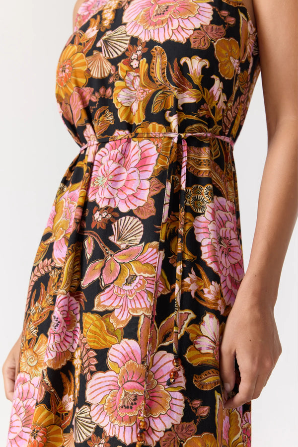 Floral dress with pink and orange flowers on a black background