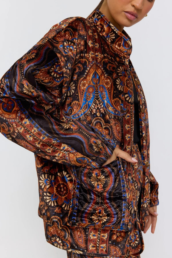 Patterned jacket worn by a person on a white background